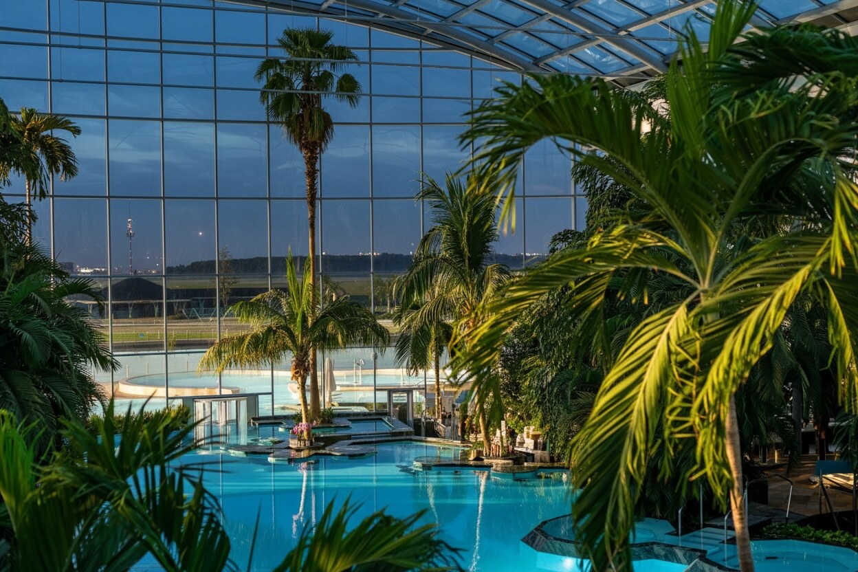 Therme Bucharest The Palm indoor thermal pools at night
